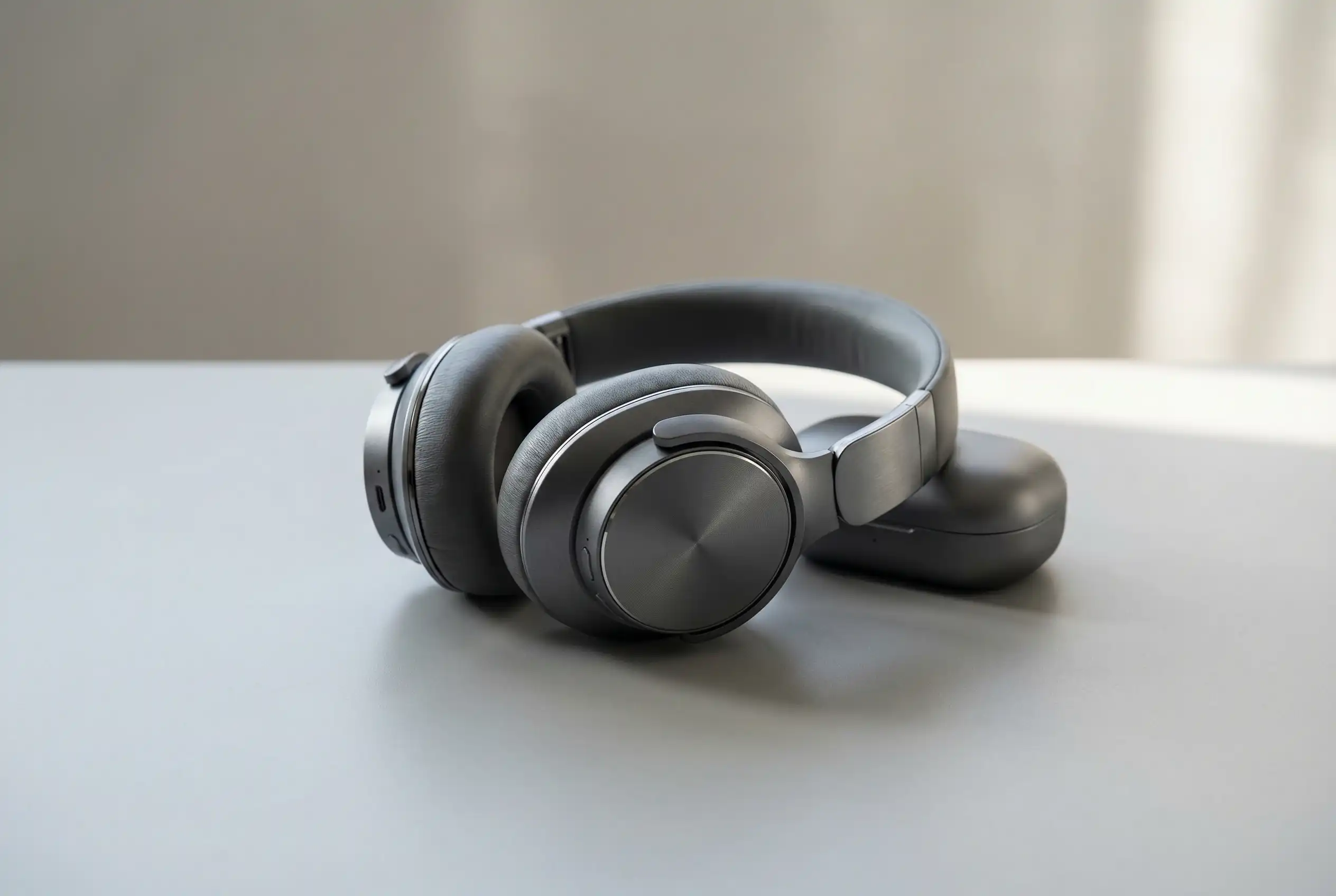 Professional ecommerce product photo of wireless headphones in a clean commercial setting
